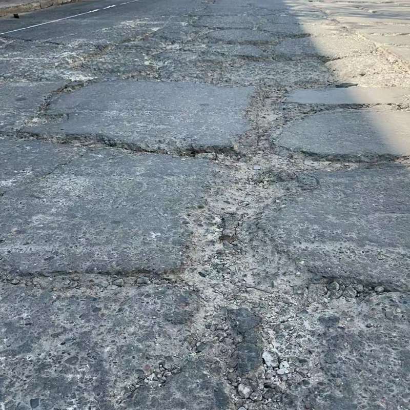 龙城路面起砂露石子修补料